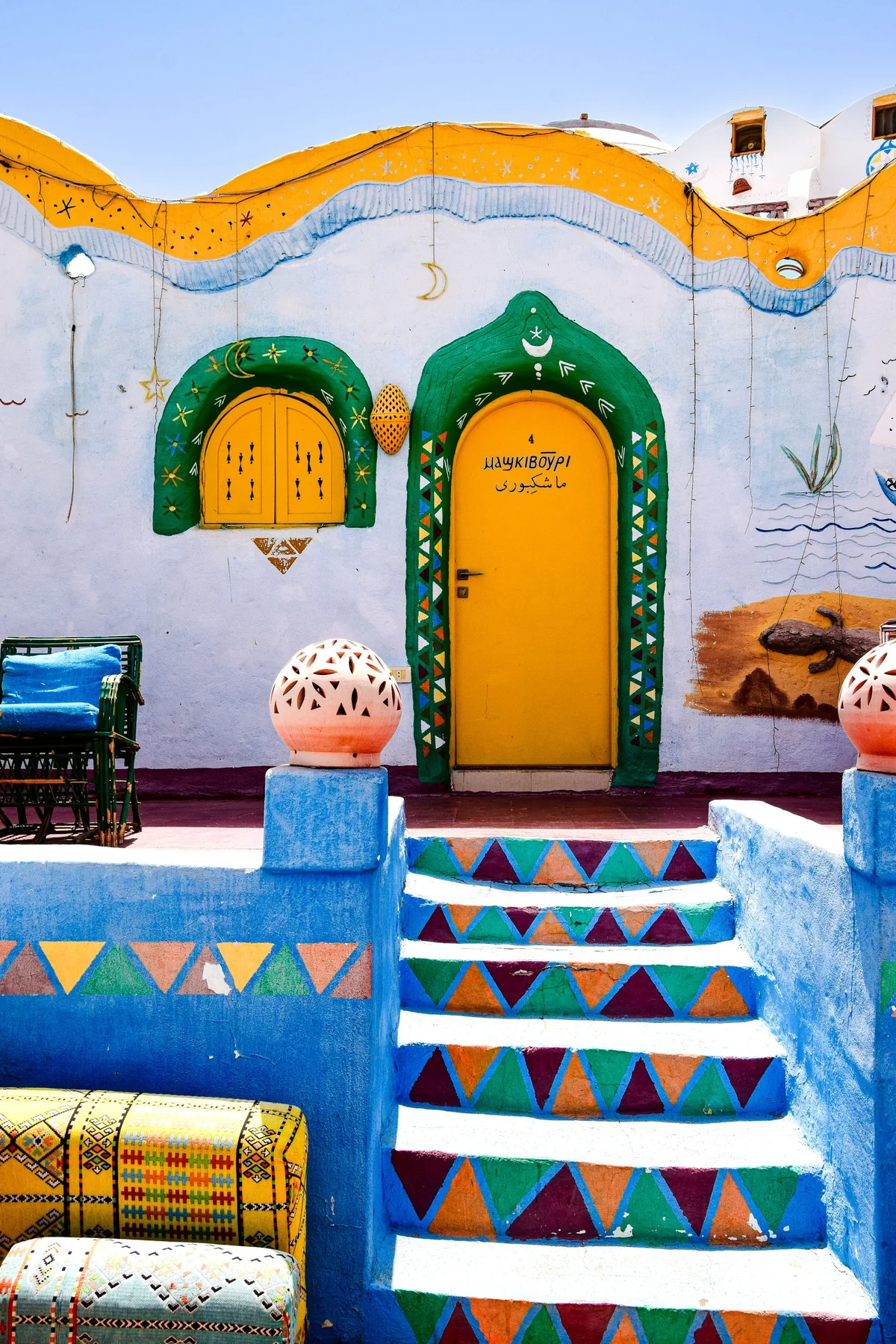 A vividly painted Nubian house in Aswan, echoing the family home and living traditions described in the chapter